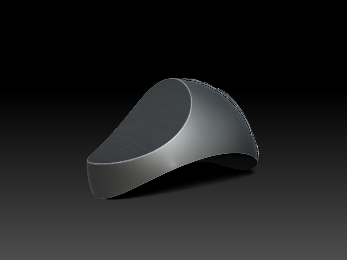Rear view of a compact carpet door stopper highlighting the smooth wedge profile and functional geometry of the design.