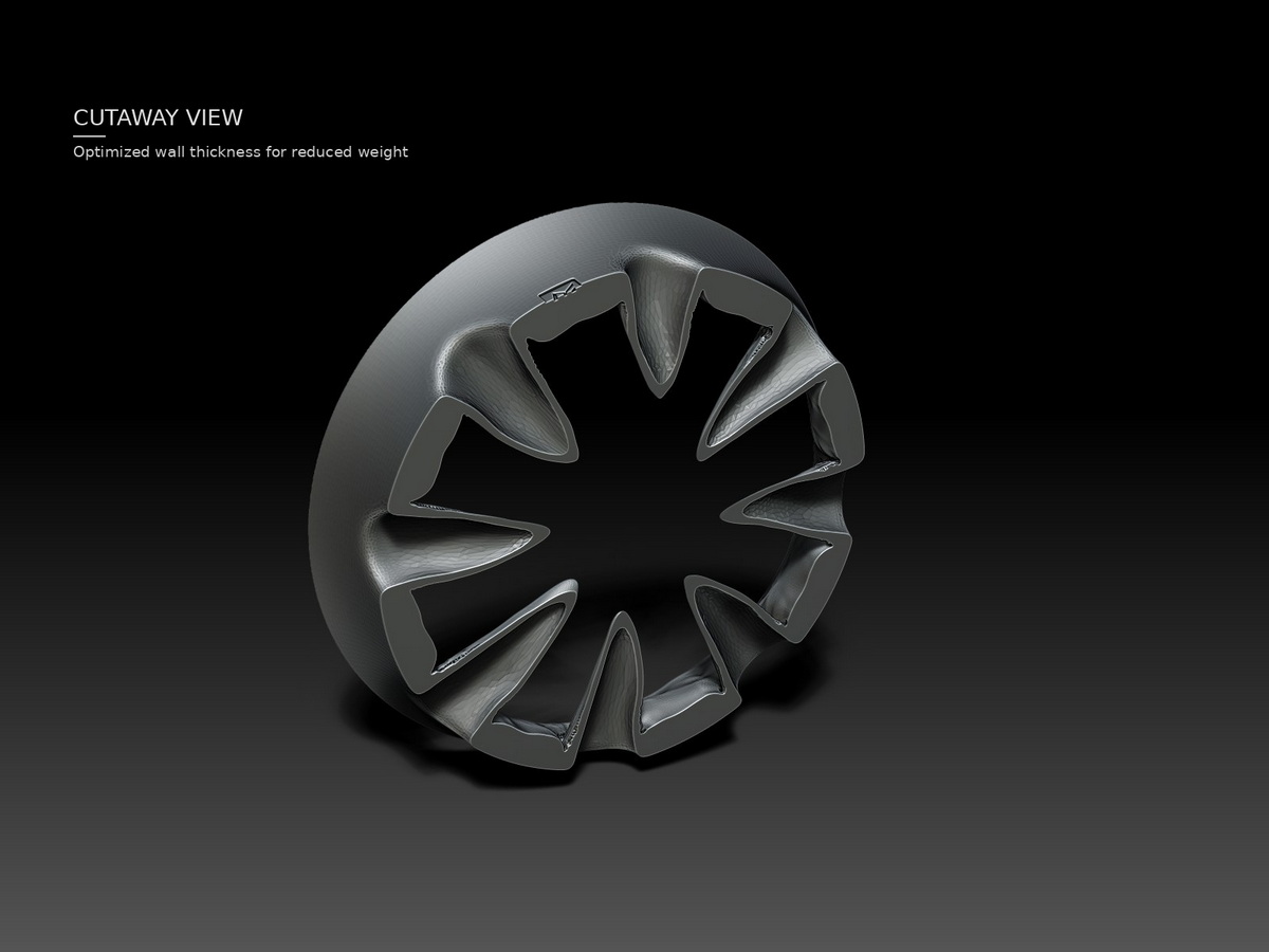 Cutaway view of the lightweight fanged ear tunnel, revealing the internal cutouts and optimized wall thickness used to reduce the weight of the sculptural body jewelry design.
