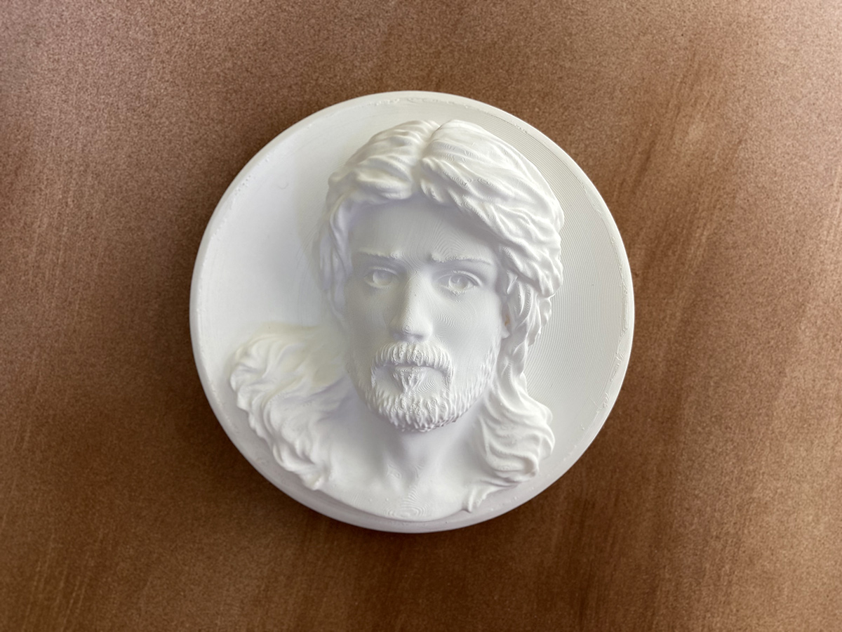 3D printed bas-relief sculpture of Jesus Christ in white, wall-mounted version