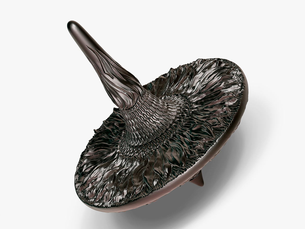 Sunflower sculptural spinning top — angled view revealing depth, flowing surface and intricate relief details