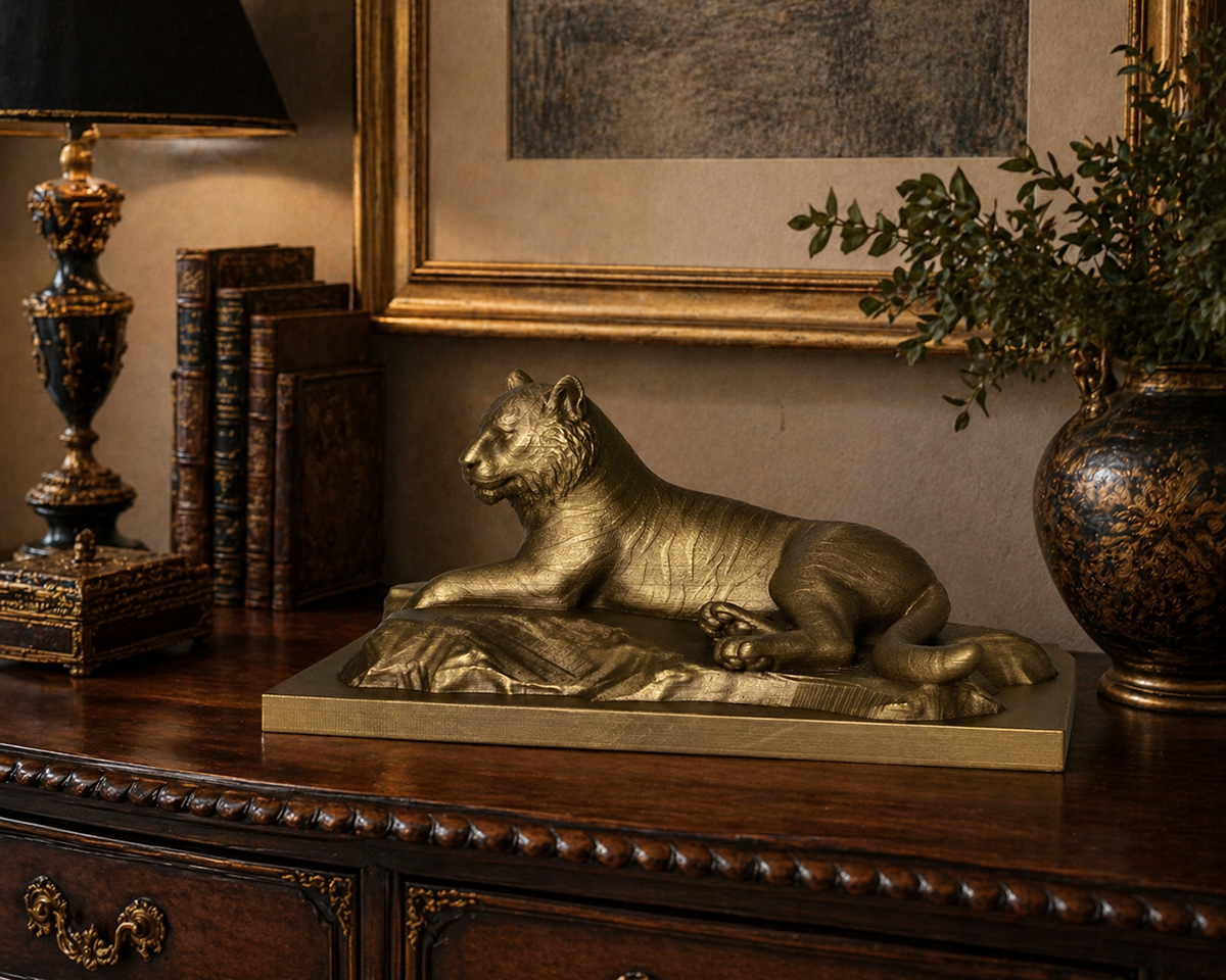 Decorative bronze tiger sculpture placed on an ornate wooden cabinet in a classic interior with books, antique decor, and warm ambient lighting
