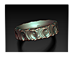 Sculptural ring design with a rough stone-like surface and flowing wave forms inspired by water and rock